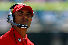 Report: ASU President Michael Crow agrees to hire Herm Edwards, will be  announced as next head coach Monday