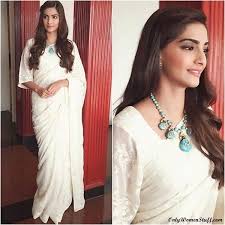 Top 15 Hairstyles For Sarees Pictures For All Types Of Face Indian Hairstyles For Saree Hair Style On Saree Traditional Hairstyle