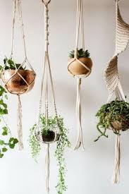 A simple yet effective approach, you can use ropes to hang planters of your choice on walls to grow different plants. Ideas To Decorate With Hanging Plants Decor Tips