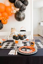 Use a moss runner from the craft store as the base for your table setting. Kara S Party Ideas Classic Halloween Party For Kids Kara S Party Ideas