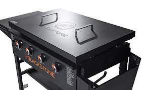 Easy assembly with a quick and easy ignition button; Blackstone 4 Burner 36 Griddle Cooking Station With Hard Cover 70000005 Walmart Com Walmart Com
