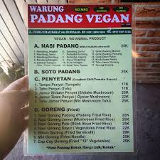 Zhkevin manis beach, padang island, a famous tourist resort in west sumatra, indonesia, has beautiful scenery, beautiful sea and sky, sparkling blue waves, whispering southern. Padang Vegan Padangsambian Bali Restaurant Happycow