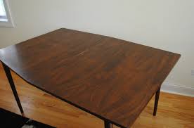 Looking to spruce up your dining area? Mid Century Modern Walnut Dining Table Phylum Furniture