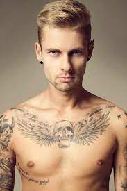 Winged Skull Tattoo Chest Again Good Placement Just Needs A Little Bigger And To Look Less Like A Sketch Tattoos Chest Tattoo Tattoos For Guys