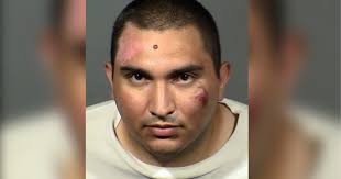 Man arrested in Las Vegas for punching, chasing Black man