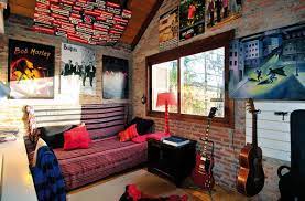 This is a really beautiful and creative music themed bedroom, decorated in a subtle way with a hanging guitar as a decorative element and accordions. 15 Interesting Music Themed Bedrooms Home Design Lover