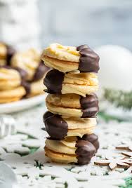 It is one the many cookies from her christmas cookie collection. Linzer Kipferl Austrian Chocolate Dipped Crescent Sandwich Cookies