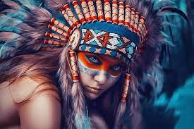 In some, she is given the role of the mutilator of the bodies of the fallen. Hd Wallpaper Women Native Americans Eyes Artwork Headdress Colorful Painting Face Paint Feathers Wallpaper Flare