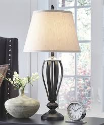 The rounded edges of these table lamps make a subtle but beautiful statement in any room of the house. Ashley Furniture Table Lamps Online