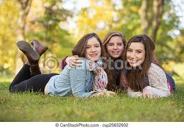 Find images of teen girl. Three Happy Female Friends Trio Of Happy Teen Girls Laying Down On Grass Canstock