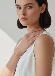 Bracelets en nacre et fleurs d'orchidées