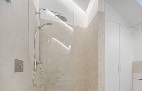 Slate tile around the shower enclosure brings in an appealing look to the entire bathroom. How To Clean A Travertine Shower Homeviable