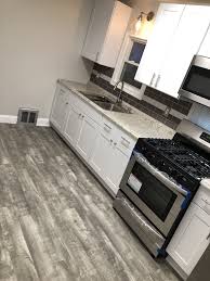 Home Decorators Stony Oak Grey Vinyl Plank Flooring White Shaker Kitchen Cabinets Grey Vinyl Plank Flooring Vinyl Plank Flooring Vinyl Flooring Kitchen