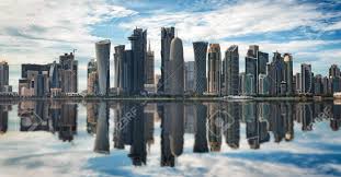 Doha fountain skyline and harbour. The Skyline Of Doha Qatar On A Sunny Day With Reflections In The Water Stock Photo Picture And Royalty Free Image Image 94657464