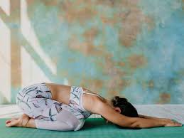 Uttanasana — standing forward bend pose. 15 Benefits Of Yoga For Calming Your Mind And Moving Your Body Self