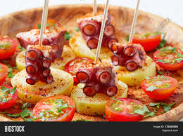 You can find octopus with potatoes in all seafood restaurants and in the seaside resorts it is very common perhaps with little. Galician Octopus La Image Photo Free Trial Bigstock