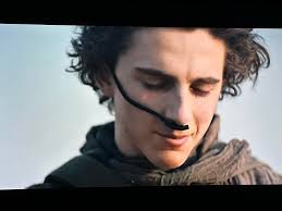 Why is the main character smiling at the end of Part 1 of Dune?