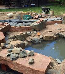 Finally a few solar lights. Pond Construction Stacked Flagstone Around A Pond S Edge Pond Trade Magazine