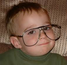 Jackson wears Papa's Reading Glasses