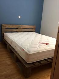 To make a full size bed frame out of pallets. Rustic King Size Pallet Bed