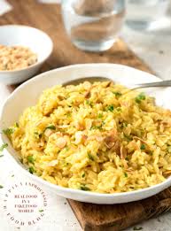 Stir in the rice, raisins, broth, salt and pepper. Perfect Rice Pilaf With Orzo And Slivered Almonds Happily Unprocessed