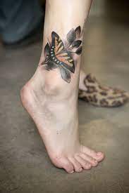 Wonderland Tattoos Butterfly Ankle Tattoo Done Right By Sean Butterfly Ankle Tattoos Neck Tattoo Butterfly Tattoo