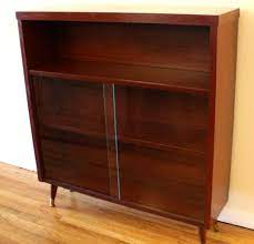 Perfect for displaying those treasures, this attractive walnut display cabinet has plenty of. Mid Century Modern Bookcase With Glass Doors Picked Vintage