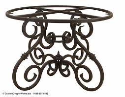 The cleo round dining table with 48 clear tempered glass top with stainless steel base is a beautifully made table that will add style and beauty to your dining area. 100 Custom Forged Iron Table Base Options