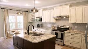 The versatility of white kitchen cabinets offers endless design possibilities when it comes to choosing the right backsplash material. Off White Kitchen Cabinets With Backsplash Youtube