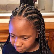 A Cute Protective Style For The Summer Or A Vacation Away If Done Correctly Protective Styles Can Help Wit Natural Hair Styles Hair Specialist Kids Hairstyles