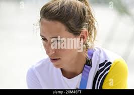 Paris, France. 25th July, 2024. Marissa Williamson of Australia arrives for  her bout with Anna Luca Hamori of Hungary along with Boxing Australia  national coach Santiago Nieva (2nd left) during the Women's