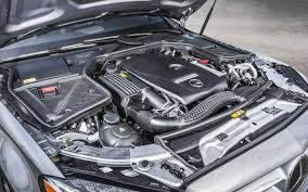 Open the hood and remove the engine cover. 2015 Mercedes Benz C300 And C400 First Drive
