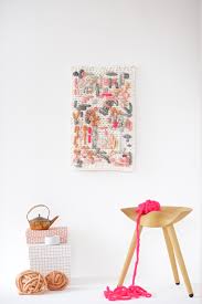 Do you have a stash of gorgeous fabric that's too good to be why not create a beautiful display and showcase your collection on your wall? 25 Diy Yarn Wall Hangings