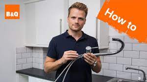 Tighten the adjusting ring to fix leaks in the handle's base. How To Replace A Kitchen Tap Part 1 Preparing Your New Tap Youtube