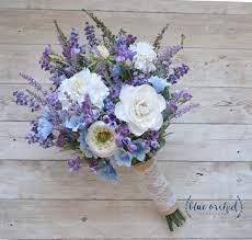 Rustic Wedding Bouquet Blue And Lavender Wildflower Bouquet With Cream Ranunculus And Thistle Rustic Wedding Bouquet Flower Bouquet Wedding Blue Wedding Bouquet