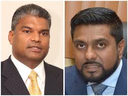 Former Attorney General Anand Ramlogan SC and UNC Senator and  attorney-at-law Gerald Ramdeen are in police custody in connection with  anti corruption investigation