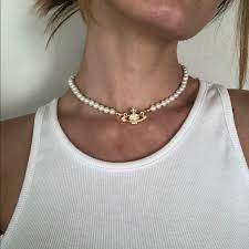 Missing 2 diamonds as shown in images. Vivienne Westwood Jewelry Vivienne Westwood Pearl Necklace In Gold Poshmark