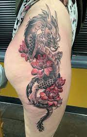 Finished Dragon With Red Lotuses Done By Caroline At Devils Rose Tattoo In Blue Point Ny Blue Point Tattoos Red Lotus