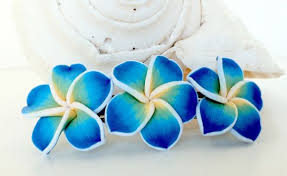 You can use these gorgeous crochet flowers to make blankets, shawls, cushions, pins or hair accessories. Hawaiian Plumeria Tribal Flower Hair Clip Or Pick Blue Wedding Luau Bridal Beach
