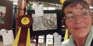 I had been carrying around this wooden token that a cancer patient at my  job had made for all of us. I knew it had to stay here.