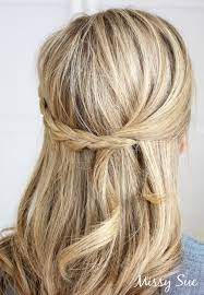 This hairstyle comes with both thin as well as thick cornrow braids in the front section tied up in a ponytail with even more braids. 20 Trendy Half Braided Hairstyles