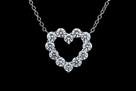 Illuminate the night and day alike with the starry glimmer of one of our slender diamond necklaces. Heart Shaped Diamond Pendant Necklace Nathan Alan Jewelers