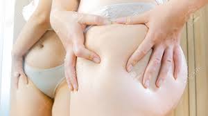 Closeup Image Of Young Woman With Big Butt Looking Herself At Mirror Stock  Photo, Picture and Royalty Free Image. Image 100308614.