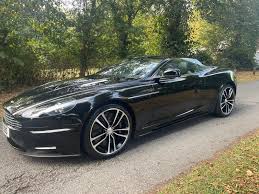 Image result for Carbon Black 2011 Aston Martin