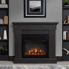 Shiny glass front panel and crystal glass bed make for a beautiful decorative piece which is also a functional heater. Real Flame Crawford Slimline 47 In Freestanding Electric Fireplace In Gray 8020e Gry The Home Depot