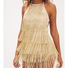 Bodysuits, swimwear, undergarments, beauty products, cosmetics, accessories and halloween products are final sale. Gold Fringe Dress From Pretty Little Things Only Depop