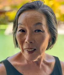 1 BIOGRAPHICAL SUMMARY: Donna Taniguchi Donna Deai Taniguchi is the  daughter of Kiyoshi Deai and Katherine Kimie Nishimura Deai.