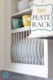 But, first, please remember to i just ran a bead of wood glue on some quarter molding and taped it to the shelf. Diy Inside Cabinet Plate Rack Remodelando La Casa
