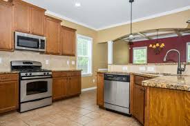 Grey kitchen cabinets with brown countertops with white cabinets. White Cabinets With Warm Granite Advice Please