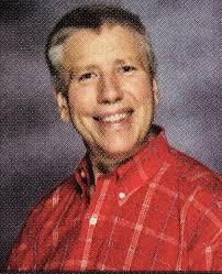 High school seniors painting parking spaces in Iowa